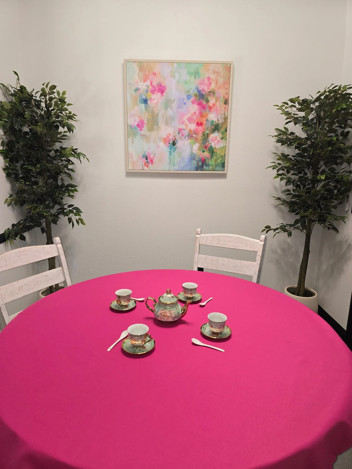 Private table with tea service and floral art