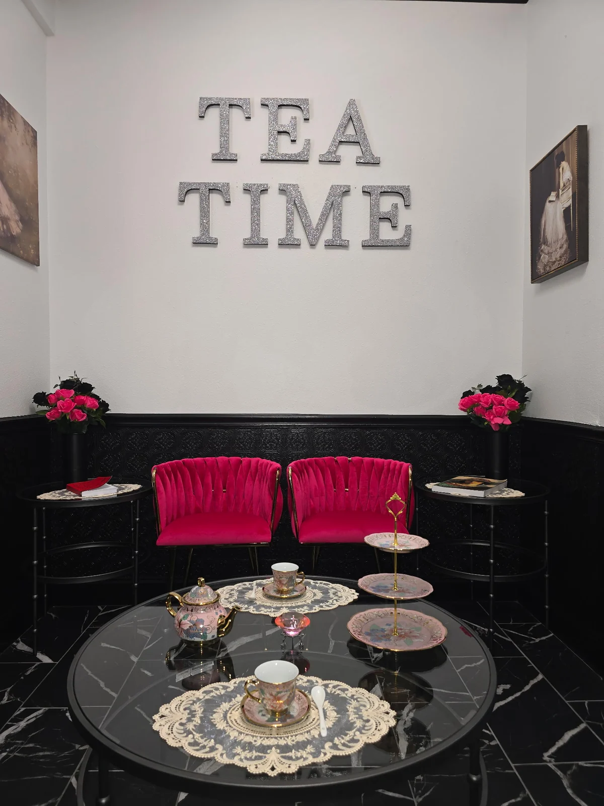 Black and pink Tea Room arranged with china