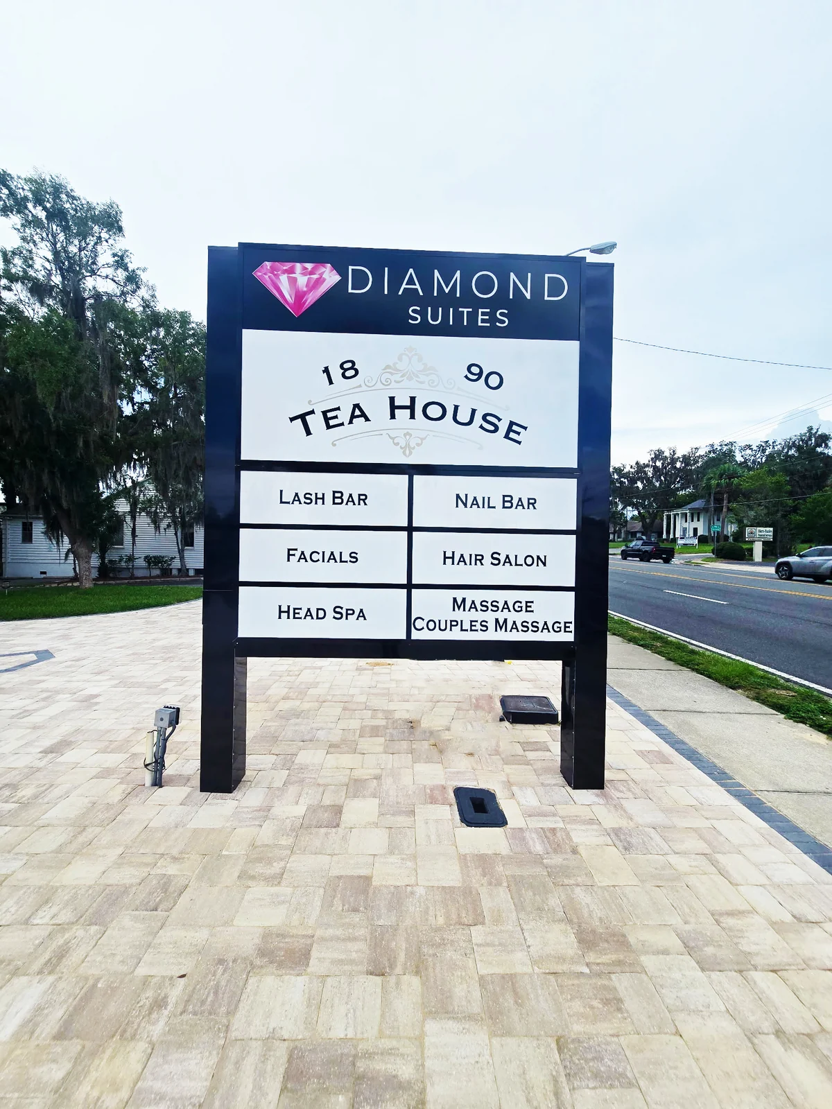 Diamond Suites roadside directory with the 1890 Tea House listing